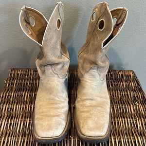 Justin men’s boots. Used but have life left.